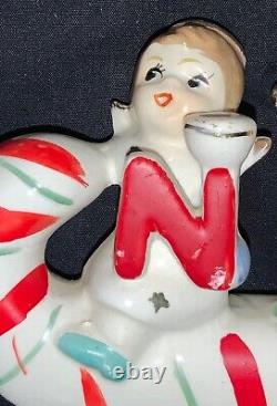 Vintage Relco Ceramic Christmas Figurine'n O E L' Angels Riding Candy Cane