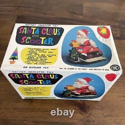 Vintage Santa Claus on Scooter Tin Litho Battery Operated Christmas Toy With Box