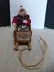 Vintage Simpich Christmas Caroler Apple Sled Baby 1998