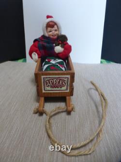 Vintage Simpich Christmas Caroler Apple Sled Baby 1998