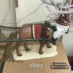 Vintage animated Santa on sleigh w reindeer